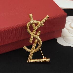 Yves Saint Laurent Gold Brooch